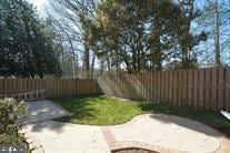 view of yard featuring a patio and a fenced backyard