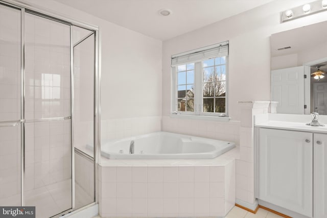 bathroom featuring a garden tub, visible vents, a stall shower, vanity, and tile patterned flooring