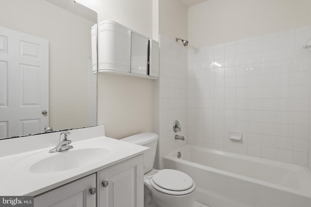 full bath featuring toilet, bathtub / shower combination, and vanity