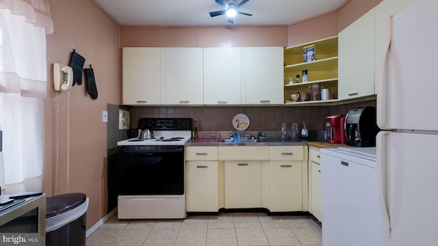 kitchen featuring open shelves, tasteful backsplash, stainless steel counters, electric range, and freestanding refrigerator