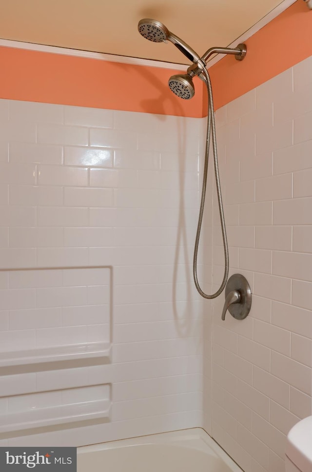 full bathroom featuring shower / bathtub combination and toilet