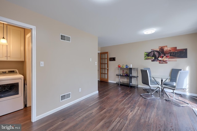 sitting room with washer / dryer, baseboards, visible vents, and dark wood-type flooring