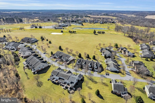 birds eye view of property featuring a residential view and a water view