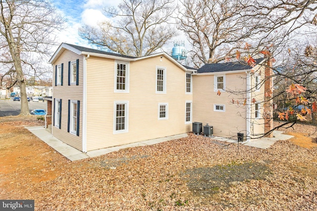 view of side of property featuring cooling unit