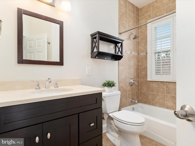 bathroom with toilet, vanity, and bathtub / shower combination