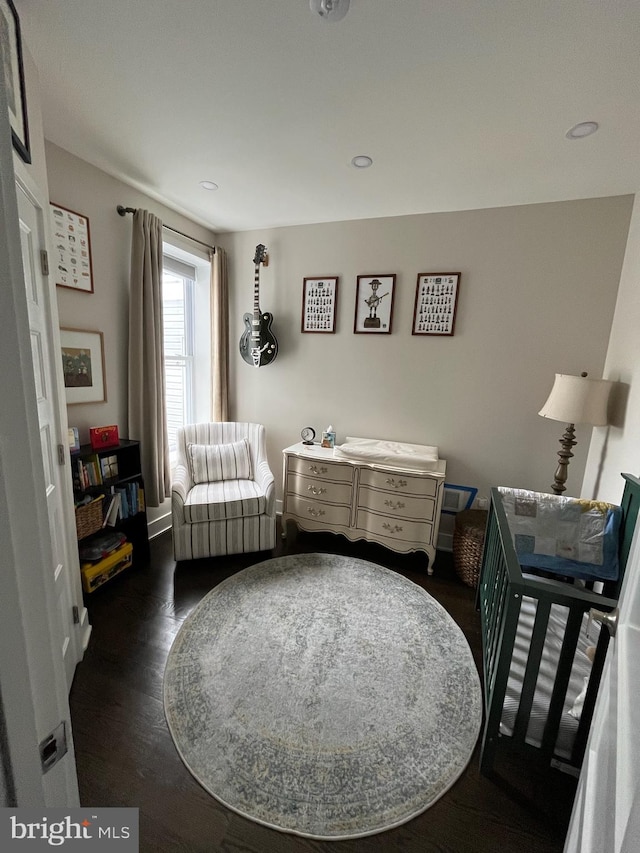 sitting room featuring wood finished floors