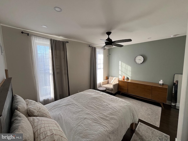 bedroom featuring ceiling fan and wood finished floors