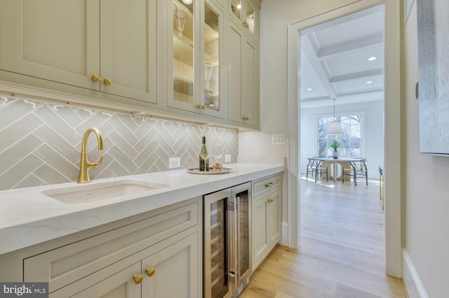 bar featuring backsplash, a sink, beverage cooler, coffered ceiling, and beamed ceiling