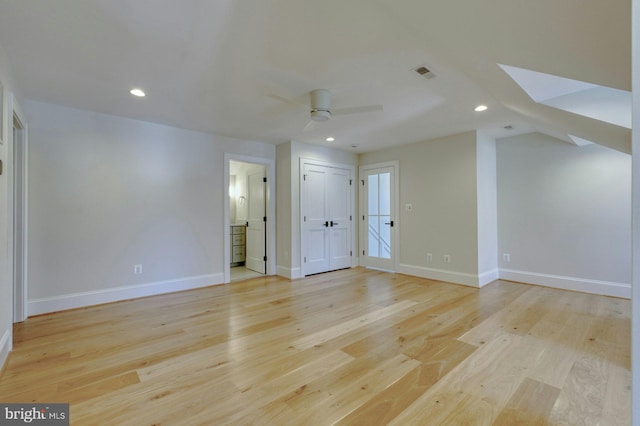 interior space with ceiling fan, light wood-style flooring, recessed lighting, visible vents, and baseboards