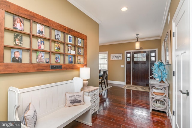 foyer entrance with dark wood-style floors, recessed lighting, baseboards, and crown molding