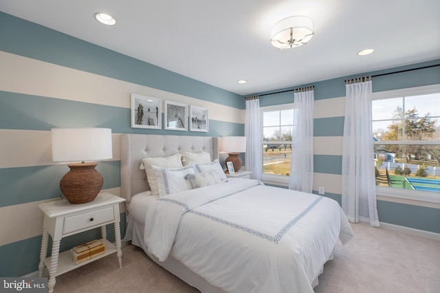 carpeted bedroom with recessed lighting and baseboards