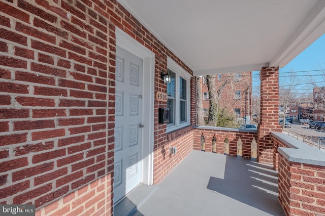 view of patio featuring a porch