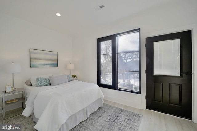 bedroom featuring recessed lighting, baseboards, visible vents, and light wood finished floors