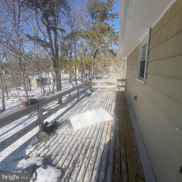 view of snow covered deck