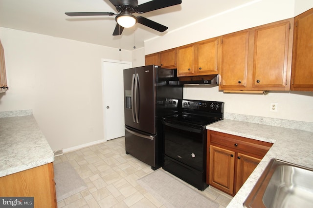 kitchen featuring brown cabinets, light countertops, black range with electric stovetop, and stainless steel fridge with ice dispenser