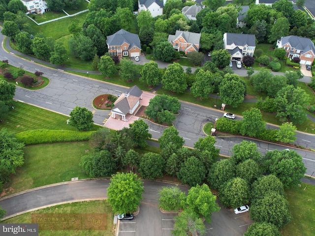 birds eye view of property with a residential view