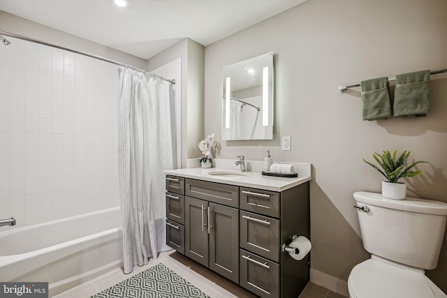 full bathroom featuring shower / bath combo, vanity, toilet, and tile patterned floors