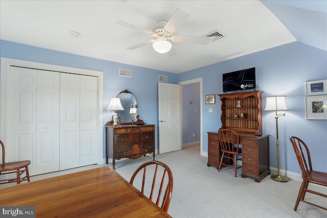 interior space featuring baseboards, visible vents, and a closet