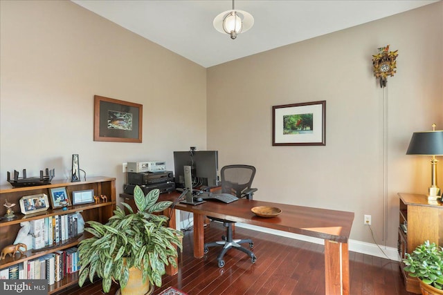 home office featuring baseboards and dark wood-type flooring