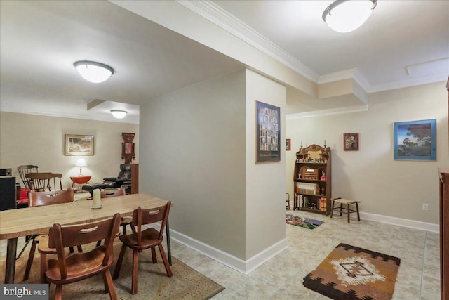 dining area with ornamental molding, light tile patterned flooring, and baseboards