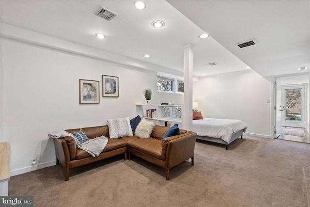 carpeted living area with baseboards, visible vents, and recessed lighting