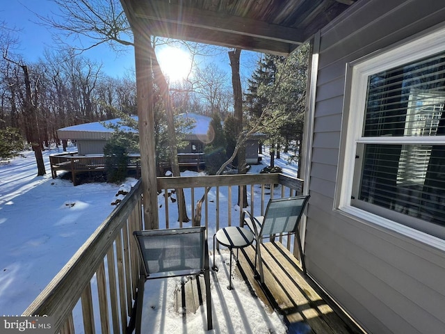 view of wooden balcony with a deck