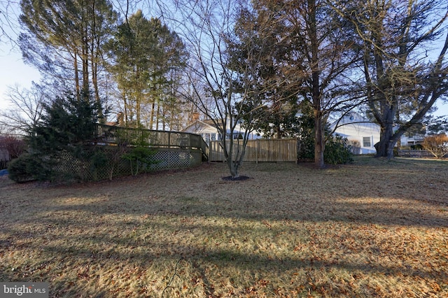 view of yard featuring fence