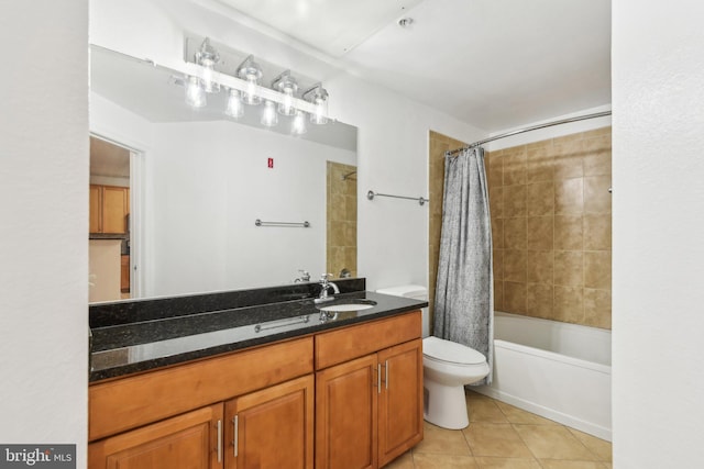 full bath featuring shower / bath combo with shower curtain, vanity, toilet, and tile patterned floors