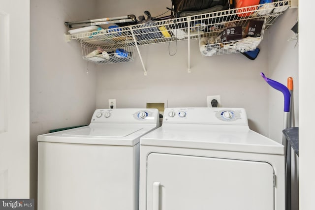 clothes washing area featuring laundry area and independent washer and dryer