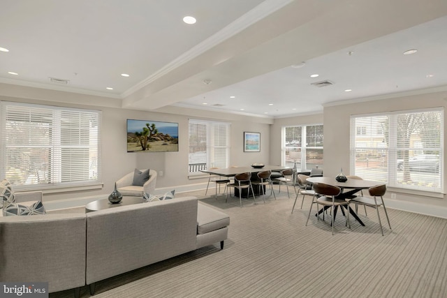 living area featuring recessed lighting, baseboards, visible vents, and ornamental molding