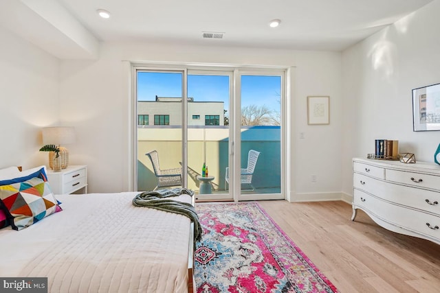 1605 Holbrook NE Unit 4, Washington, DC 20002 - bedroom with baseboards, visible vents, access to exterior, light wood-type flooring, and recessed lighting