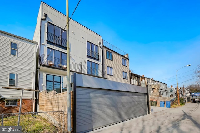 1605 Holbrook NE Unit 4, Washington, DC 20002 - view of building exterior featuring a residential view and fence