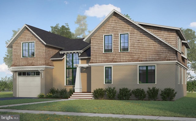 view of front of property with a front yard, brick siding, and an attached garage