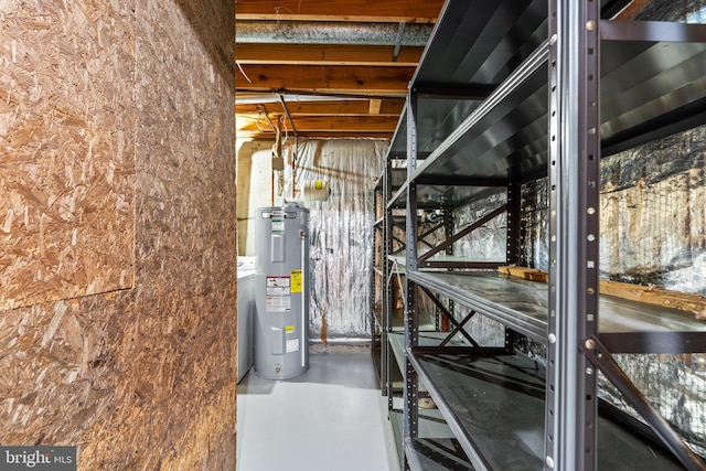 utility room featuring water heater