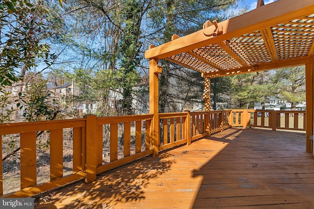 wooden deck with a pergola