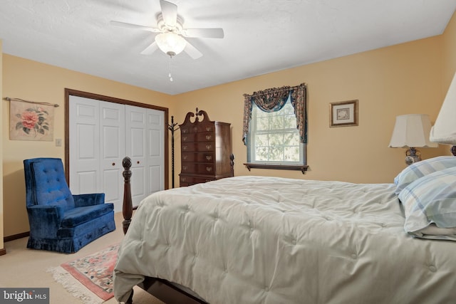 bedroom featuring a closet, carpet flooring, and ceiling fan