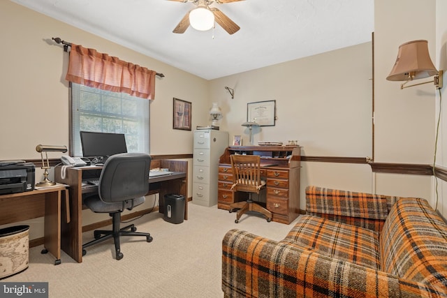 office space with carpet floors and ceiling fan