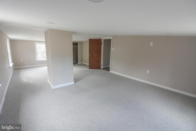 below grade area with carpet floors and baseboards