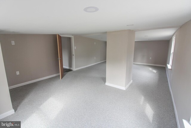 basement featuring baseboards