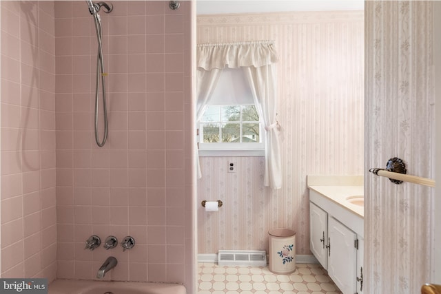 full bath featuring  shower combination, visible vents, vanity, and wallpapered walls