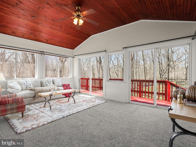 sunroom with wood ceiling, ceiling fan, and vaulted ceiling