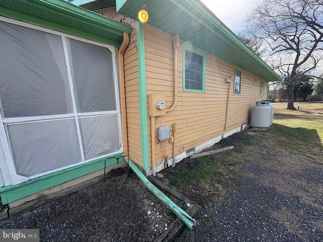 view of property exterior with crawl space