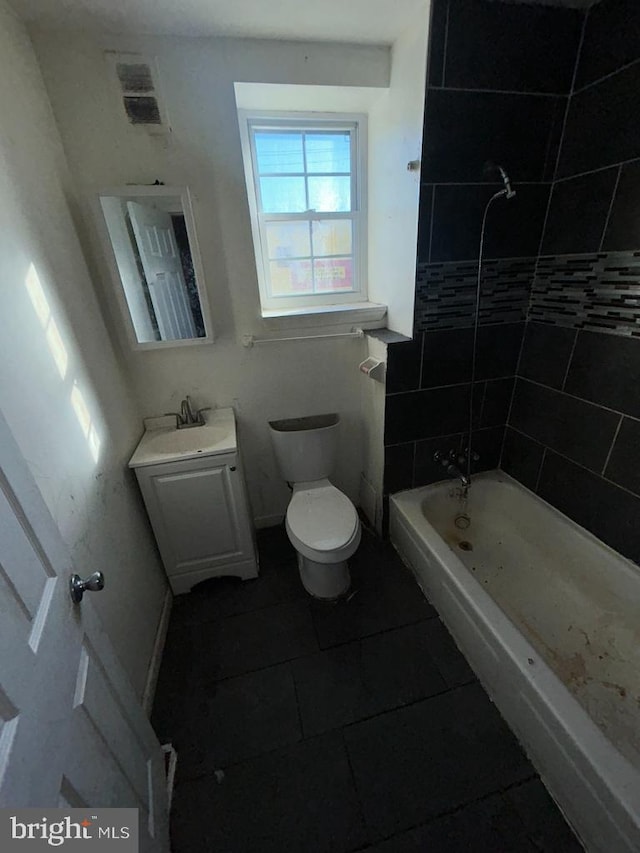 full bathroom featuring shower / bath combination, vanity, and toilet