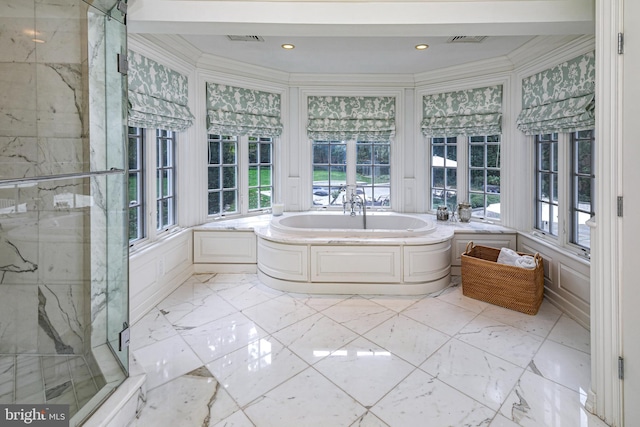 full bathroom featuring ornamental molding, marble finish floor, a garden tub, and a marble finish shower