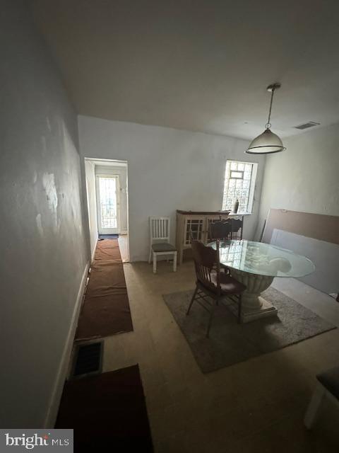 dining area featuring visible vents