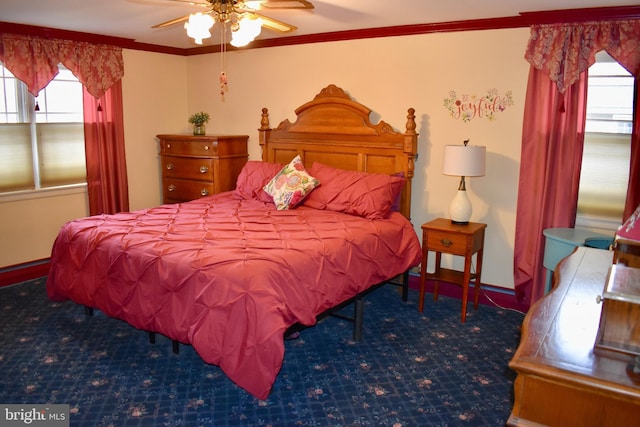 bedroom featuring ornamental molding, carpet flooring, ceiling fan, and baseboards