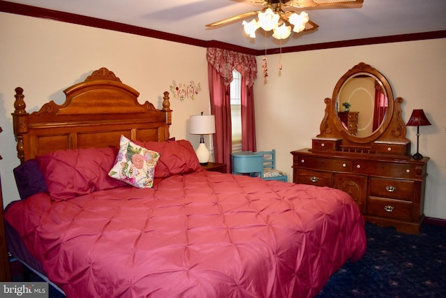 carpeted bedroom featuring ceiling fan and crown molding