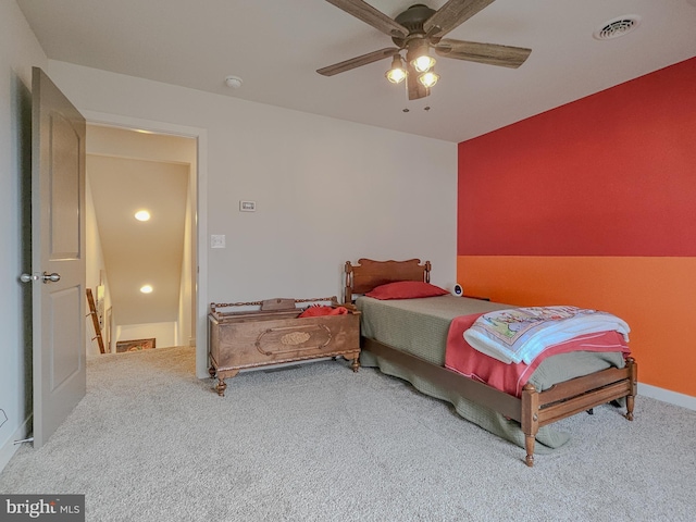 bedroom featuring ceiling fan, carpet, and visible vents