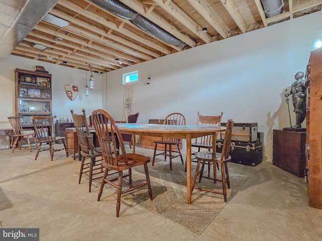 dining room with unfinished concrete floors