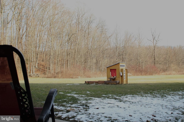 view of yard covered in snow